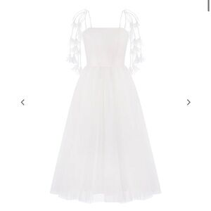 White sparkle tulle midi length dress. Tied shoulders, bow on the back.